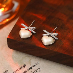 Women New Design Butter Bow Imitation Pearl Small Earring Fashion Elegant Graceful High Quality Jewelry Accessories for Ladies