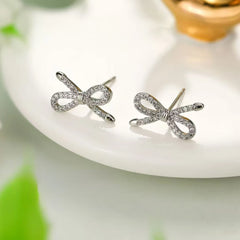 Ladies Creative Design Bow Shape Mini Small Stud Earring Fashion Glitter Sparking Simple Wholesale Jewelry Accessories for Daily