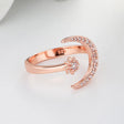 The opening is adjustable. / Rose gold