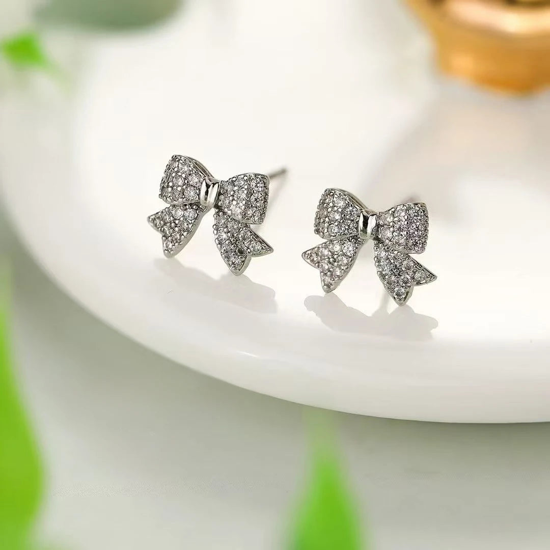 Ladies Creative Design Bow Shape Mini Small Stud Earring Fashion Glitter Sparking Simple Wholesale Jewelry Accessories for Daily