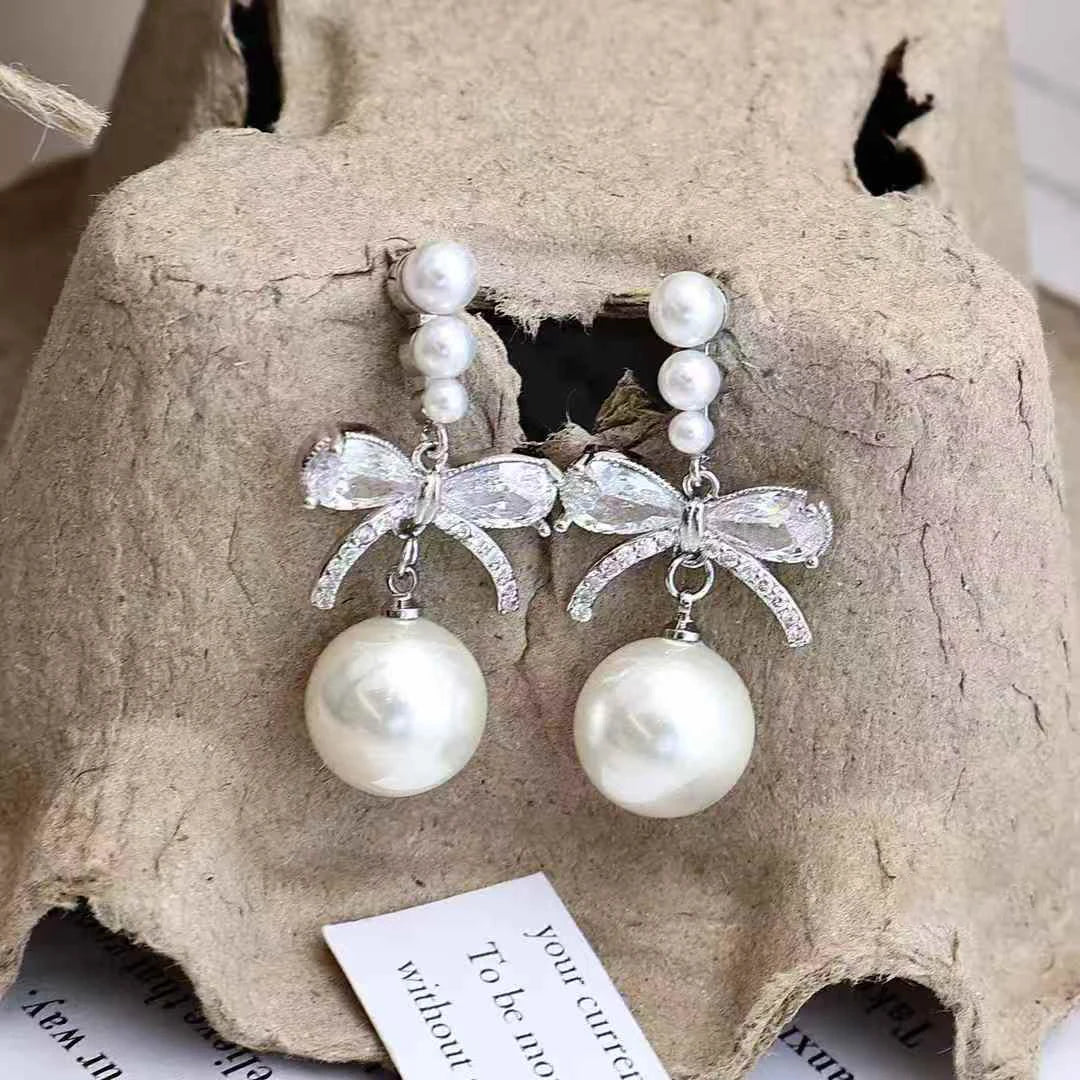 Female Hot Sale New Design Imitation Pearl Bow Rhinestone Drop Earring Fashion Glitter Charms Bulk Jewelry Accessories for Daily