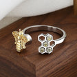 The opening is adjustable. / Gold05