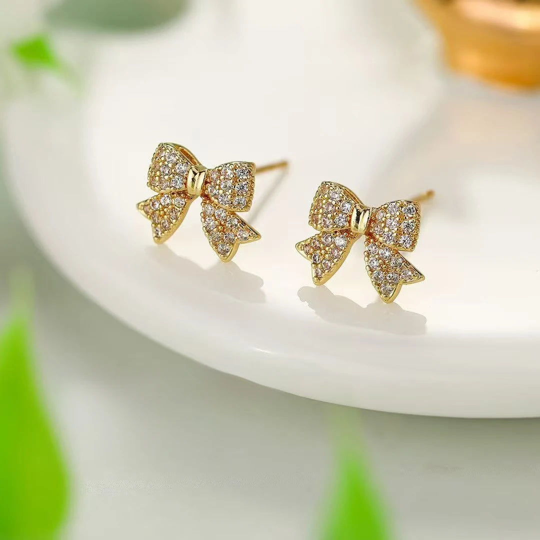 Ladies Creative Design Bow Shape Mini Small Stud Earring Fashion Glitter Sparking Simple Wholesale Jewelry Accessories for Daily