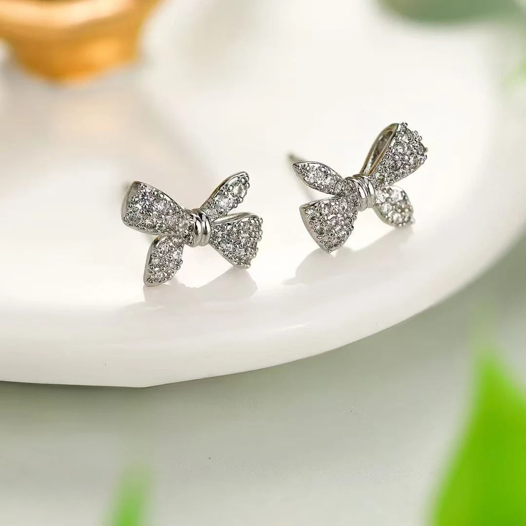 Ladies Creative Design Bow Shape Mini Small Stud Earring Fashion Glitter Sparking Simple Wholesale Jewelry Accessories for Daily
