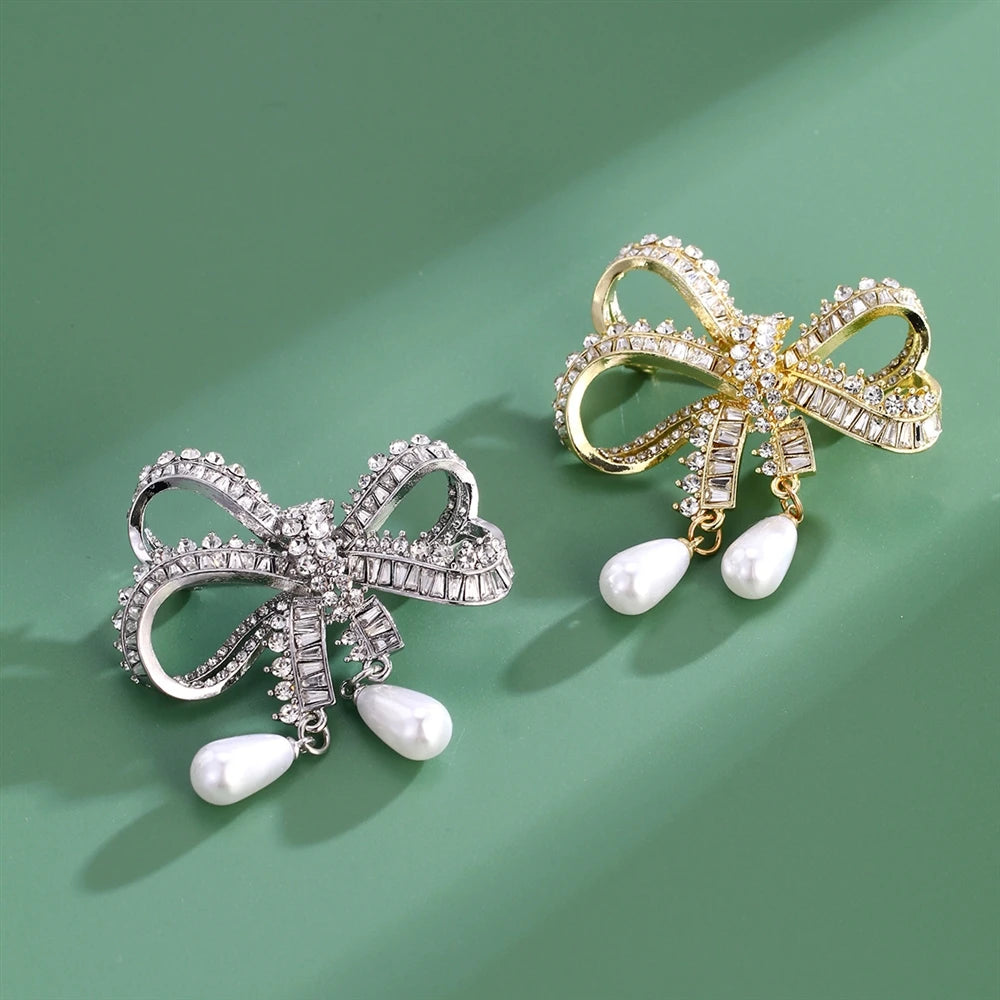 Fashion Bowknot Glitter Imitation Pearl Brooches for Girls Sparking Elegant Graceful Pins Jewelry for Women Ladies Accessories