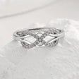 The opening is adjustable. / Silver