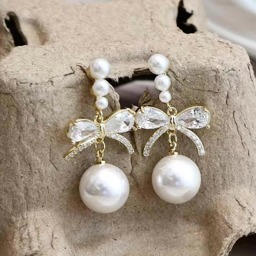 Female Hot Sale New Design Imitation Pearl Bow Rhinestone Drop Earring Fashion Glitter Charms Bulk Jewelry Accessories for Daily