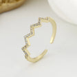 The opening is adjustable. / Gold