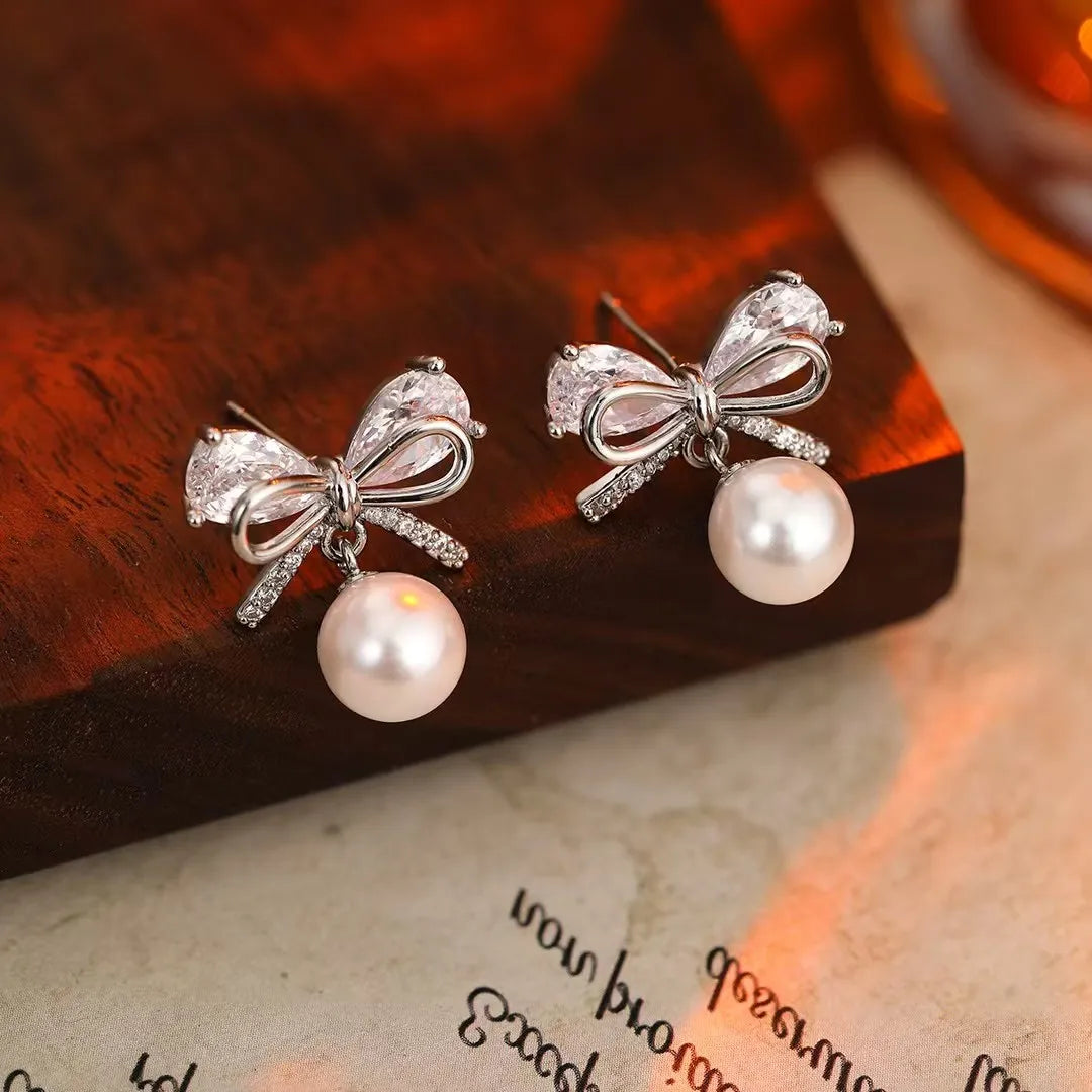 Women New Design Butter Bow Imitation Pearl Small Earring Fashion Elegant Graceful High Quality Jewelry Accessories for Ladies